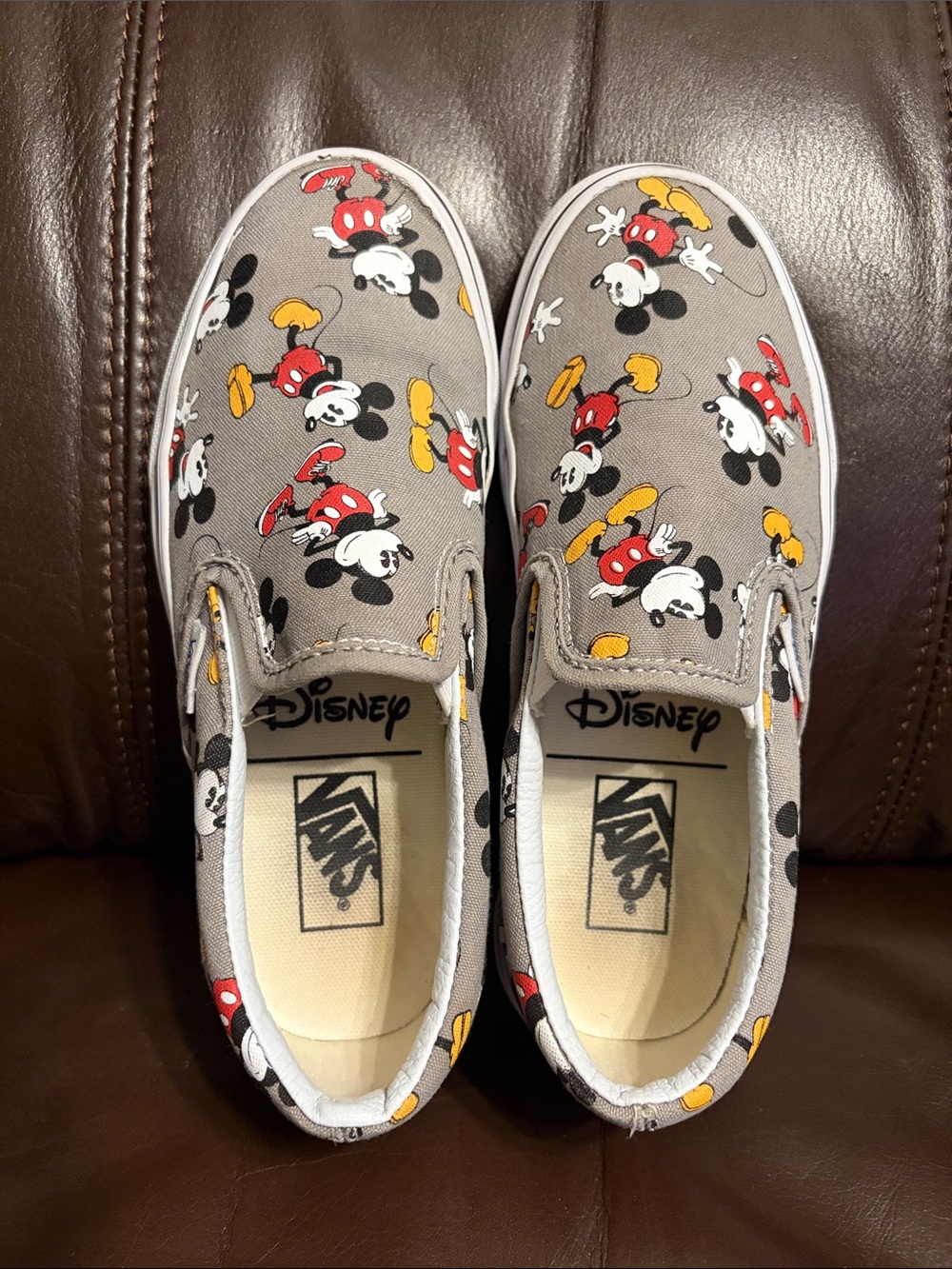 Vans Kids Mickey Mouse Grey Slip-On Sneakers with Red & Yellow Accents